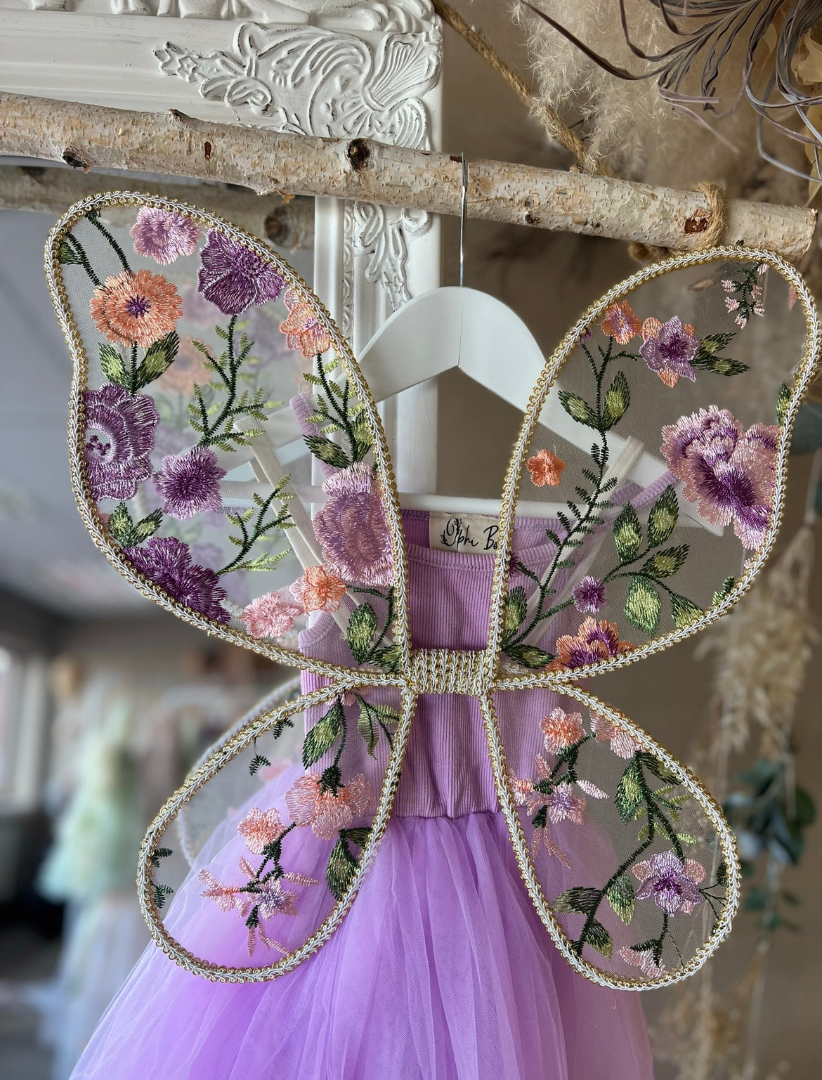 Periwinkle wings and wand